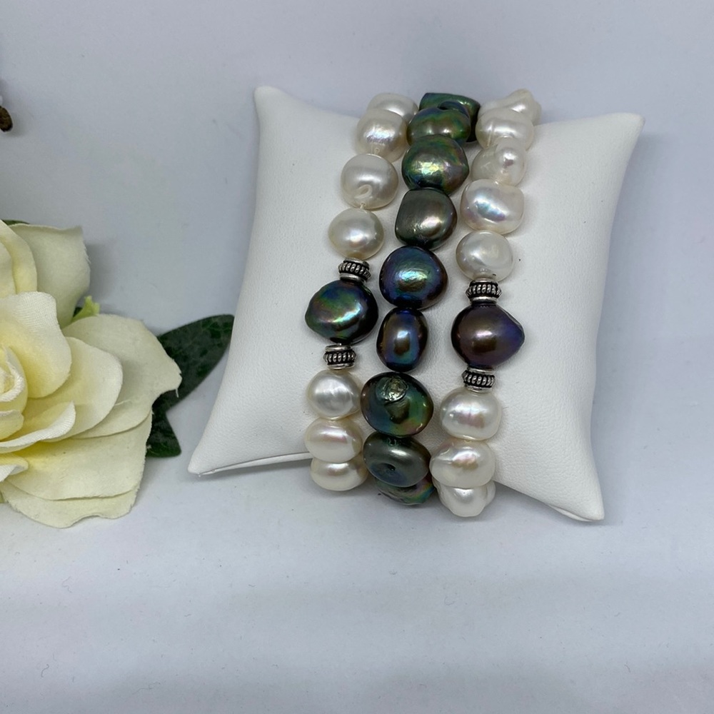 A set of 3 baroque cultured freshwater pearl bracelet. 11-13 mm with Bali beads